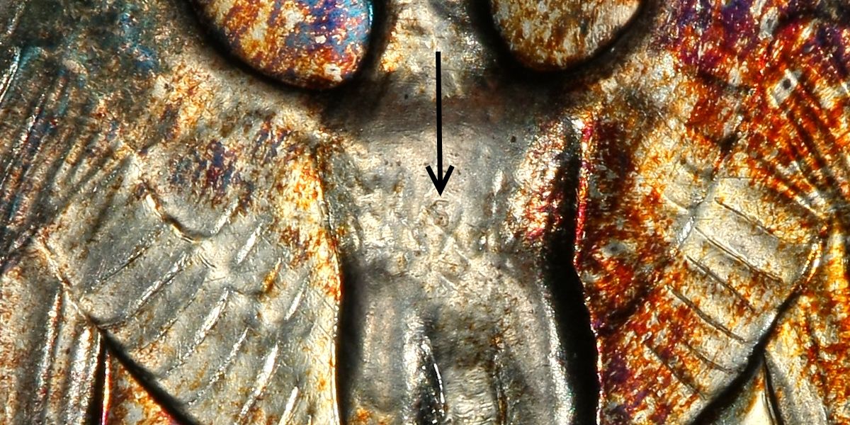 Close-up of the 1952 Superbird FS-901 proof quarter showing the S-shaped die mark on the eagle's chest