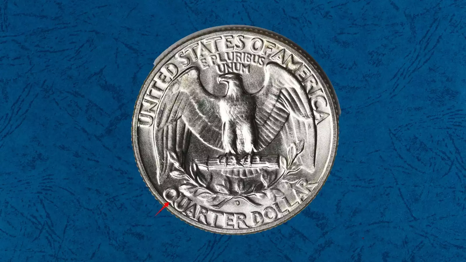 Close-up of the 1952 quarter Doubled Die Reverse showing secondary feather detail on the eagle and doubled lettering on UNITED STATES OF AMERICA